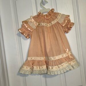 Vintage handmade child’s dress with eyelet lace embellishment. Unbranded, ? size